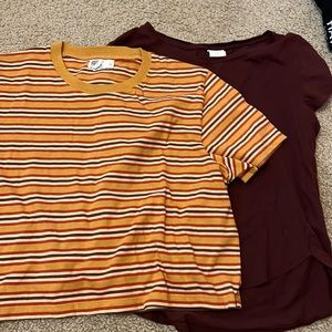 2 crop tops, one size xs, the other  L but they’d both fit a size small person